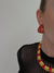 Red enamel clip on earrings